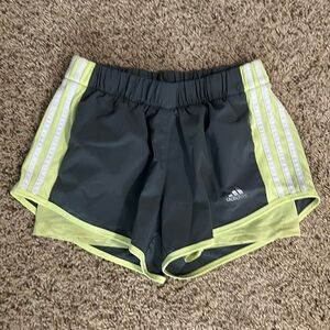 Adidas grey and green running shorts. Size small.